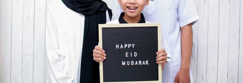 happy-young-family-muslim-on-eid-mubarak-2022-02-07-22-00-08-utc-min